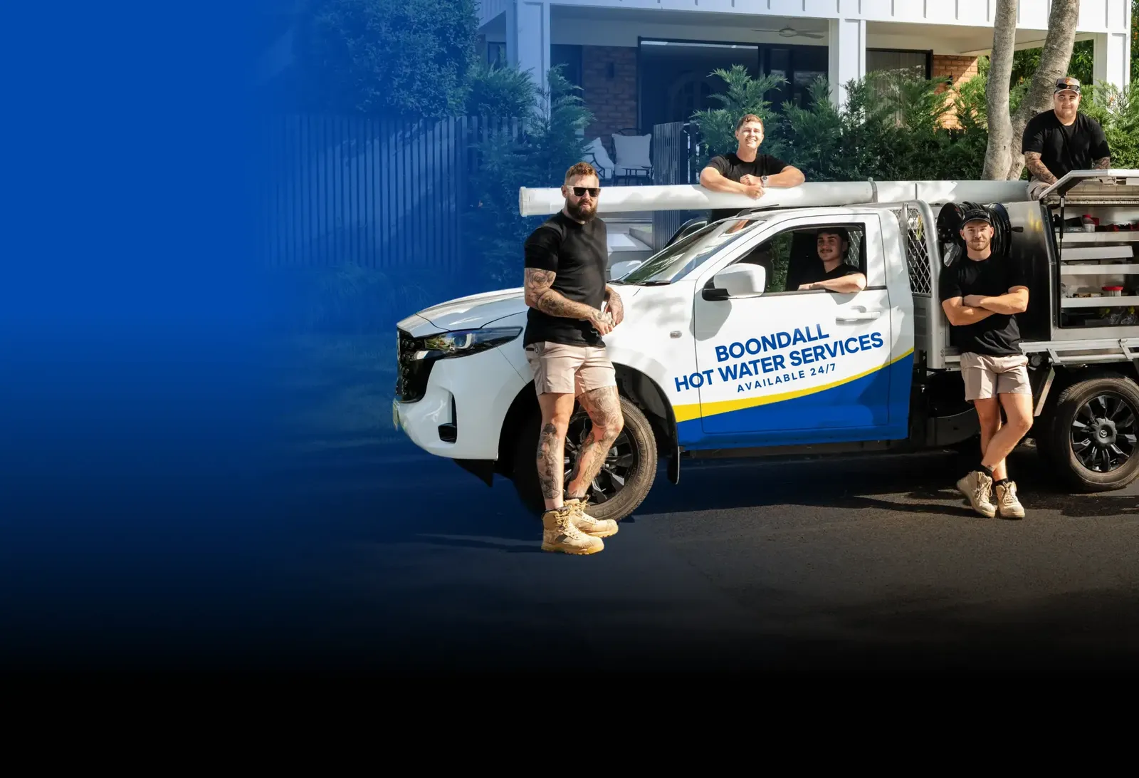 Boondall Hot Water Services team with the ute